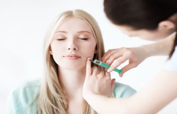 Woman receiving facial Dermal Fillers treatment in Beverly Hills CA