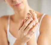 Woman watching her hands.